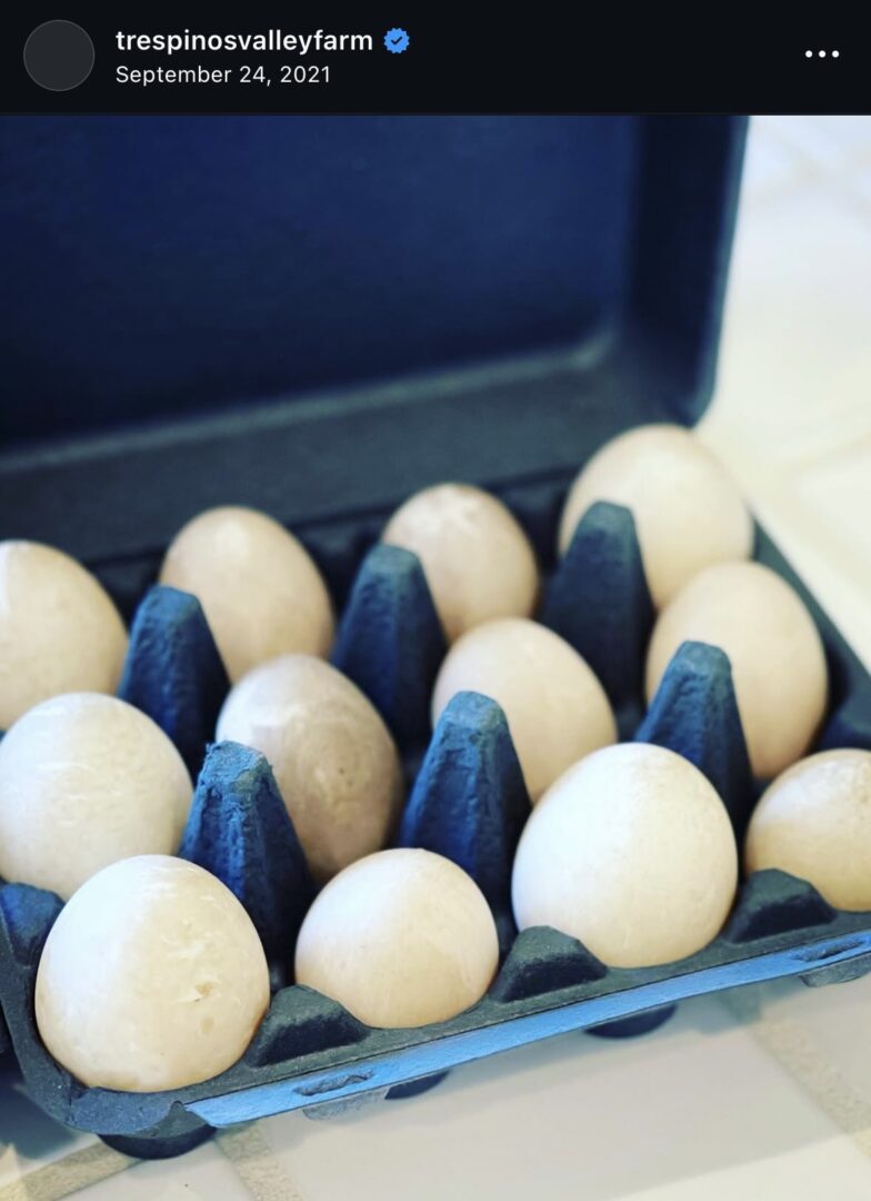 Carton of eggs on a table.