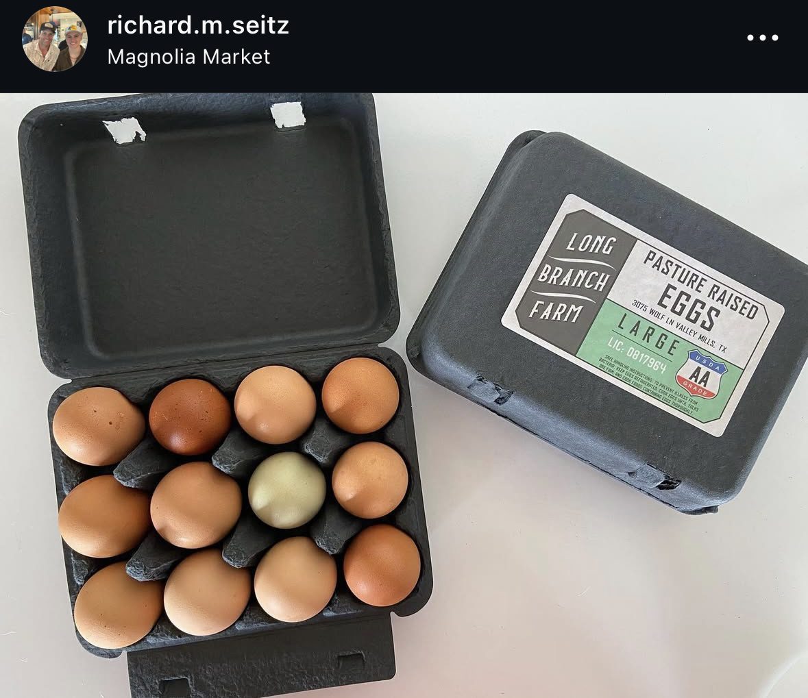 Carton of assorted pasture-raised eggs open.