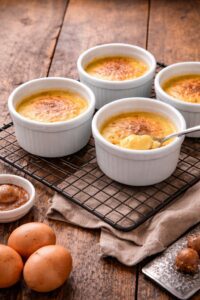 Old fashioned baked egg custard in ramekins made with farm fresh eggs